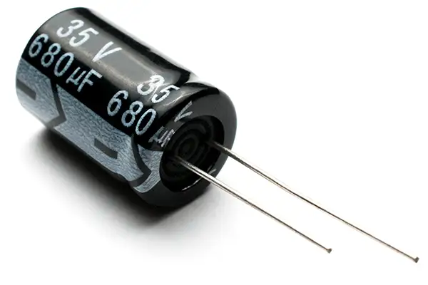 A black electrolytic capacitor in a white background