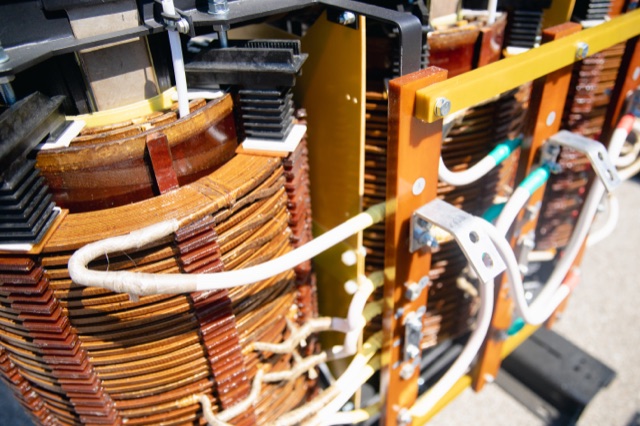 Industrial transformer coils with copper wiring and high-temperature electrical insulation layers