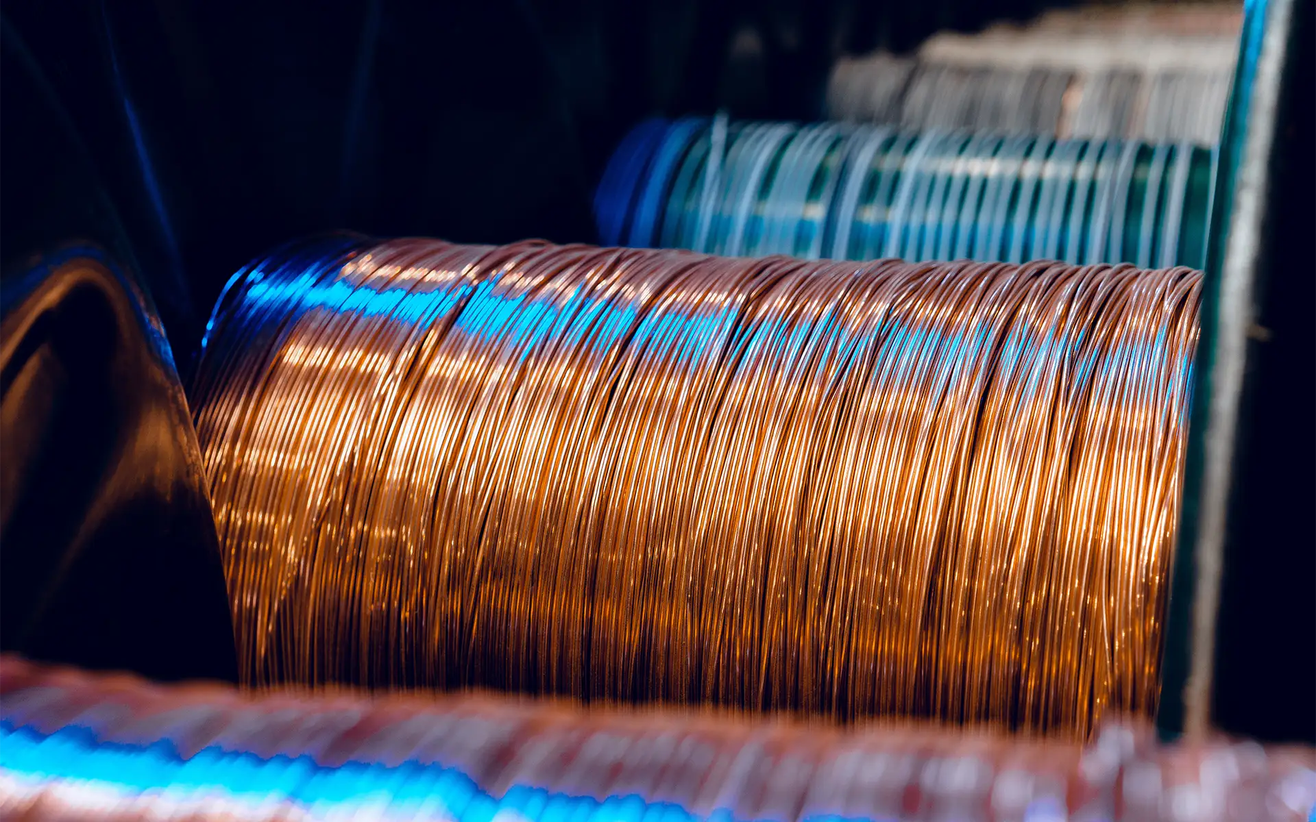 Large spools of copper wire and other cabling for wire harness design applications